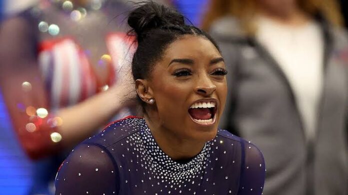 Simone Biles blows hot as she warms a fan to take it back after the fan made an offensive statement about ...;' Not Tolerating This'